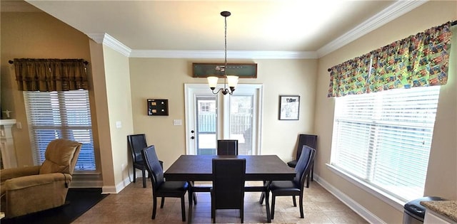 1109 Orlando Dr, Foley, AL 36535 - tiled dining space featuring crown molding, a chandelier, and baseboards