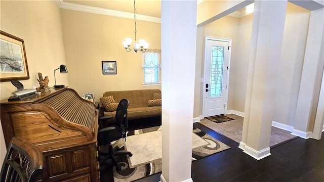 1109 Orlando Dr, Foley, AL 36535 - foyer featuring ornamental molding, dark wood finished floors, baseboards, and a chandelier