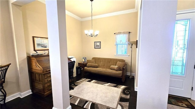 1109 Orlando Dr, Foley, AL 36535 - living room featuring ornamental molding, baseboards, dark wood-style flooring, and a chandelier