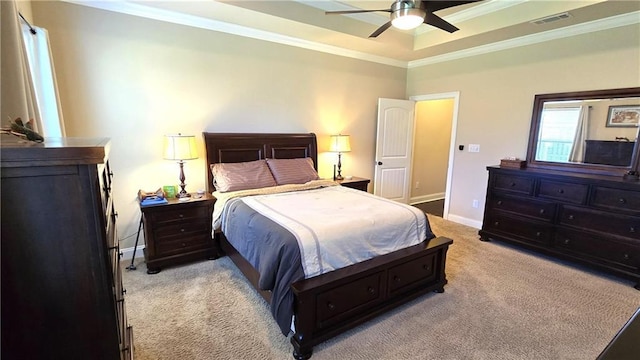 1109 Orlando Dr, Foley, AL 36535 - carpeted bedroom featuring baseboards, crown molding, a raised ceiling, and ceiling fan