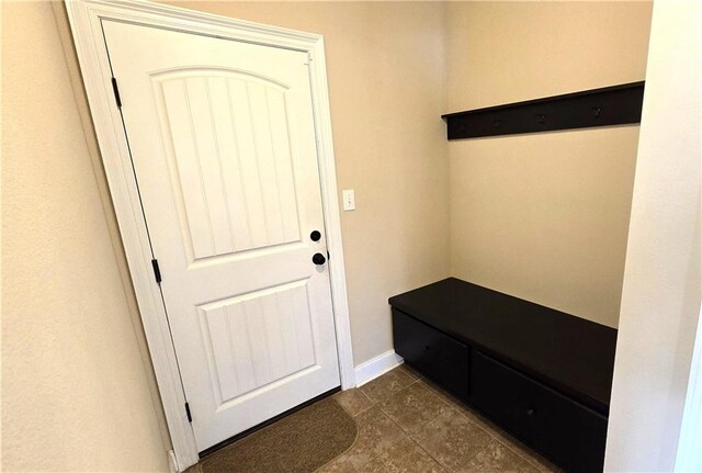 1109 Orlando Dr, Foley, AL 36535 - mudroom featuring dark tile patterned floors and baseboards