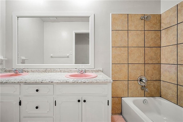 bathroom with vanity, tile patterned flooring, and shower / tub combination