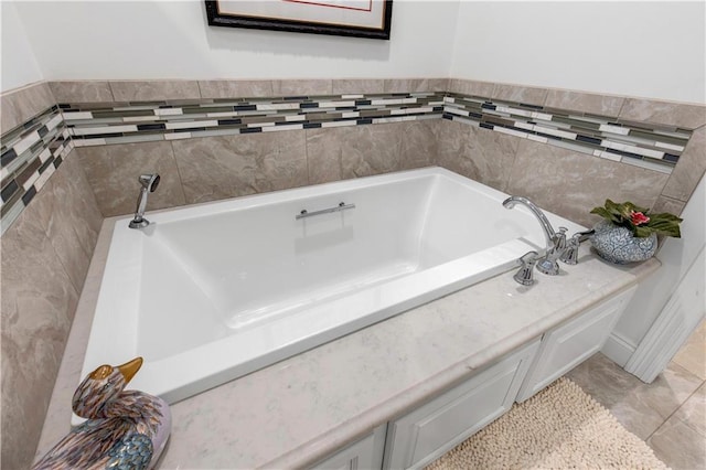 bathroom with a garden tub