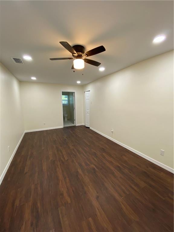 unfurnished room featuring ceiling fan and hardwood / wood-style flooring