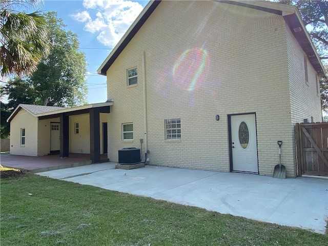 back of house featuring a patio and central AC