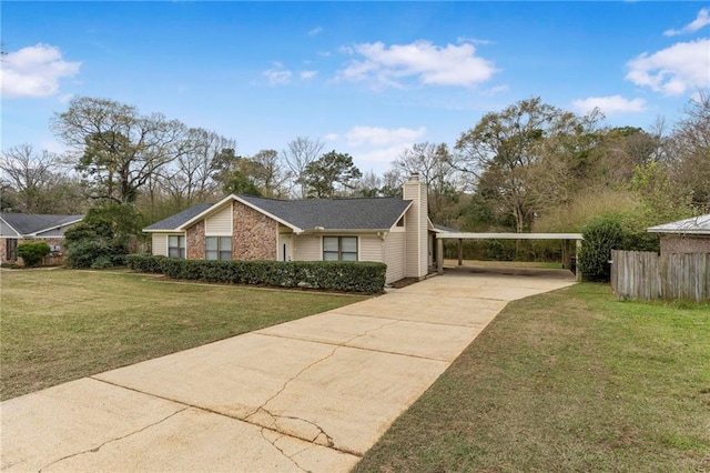 view of property exterior featuring concrete driveway, a yard, and a chimney