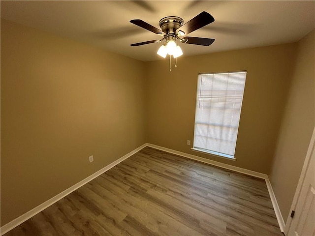 unfurnished room featuring wood-type flooring and ceiling fan