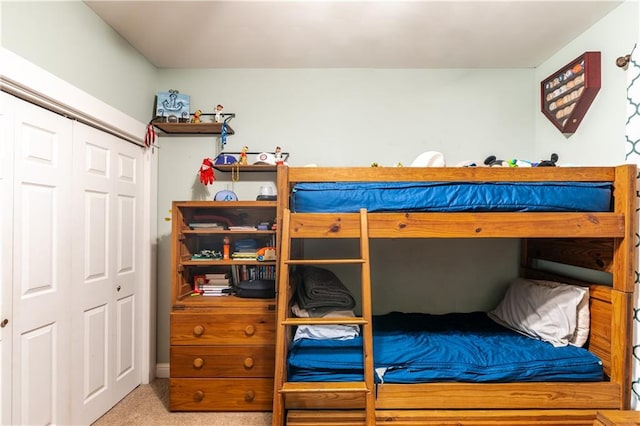 carpeted bedroom with a closet