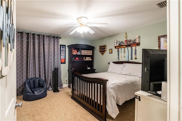 bedroom featuring carpet and ceiling fan