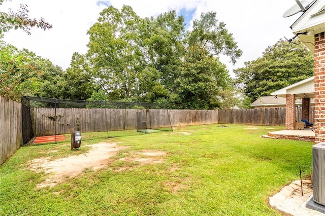 view of yard featuring a patio and central AC unit