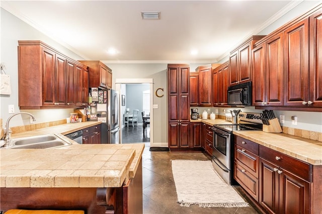 kitchen featuring appliances with stainless steel finishes, crown molding, sink, and kitchen peninsula