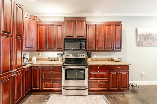 kitchen featuring dark tile patterned flooring, stainless steel electric range oven, and crown molding