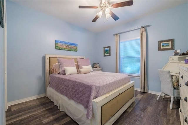 bedroom with ceiling fan and dark hardwood / wood-style flooring