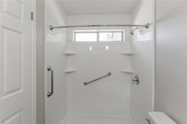 bathroom featuring walk in shower