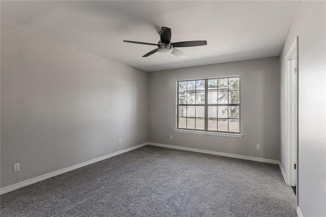 empty room with carpet floors and ceiling fan