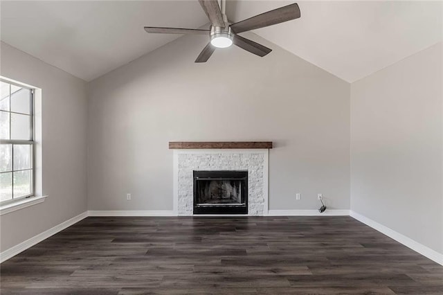 unfurnished living room with lofted ceiling, dark hardwood / wood-style floors, and ceiling fan