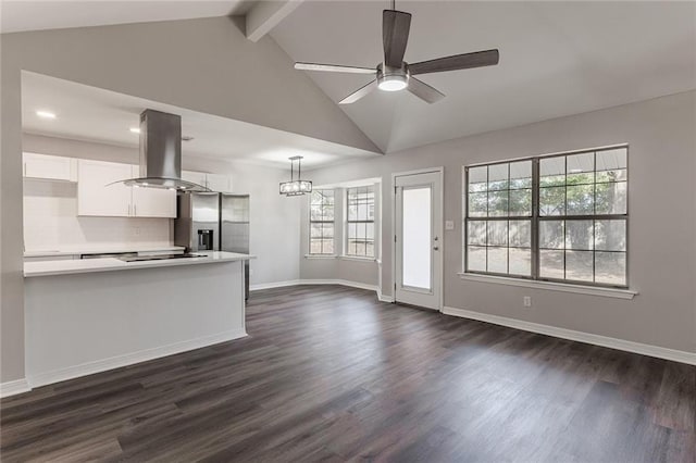 unfurnished living room with dark hardwood / wood-style flooring, vaulted ceiling with beams, and ceiling fan