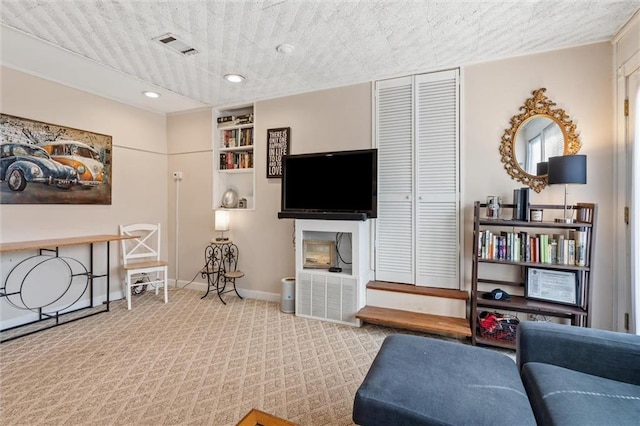 51 Jackson St N Unit A, Mobile, AL 36602 - living area with carpet flooring and recessed lighting