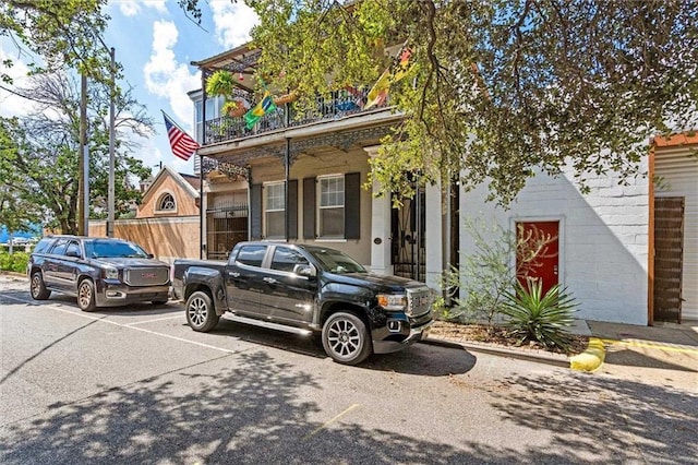 51 Jackson St N Unit A, Mobile, AL 36602 - view of front of home featuring a balcony and uncovered parking