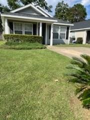 view of front of home featuring a front lawn