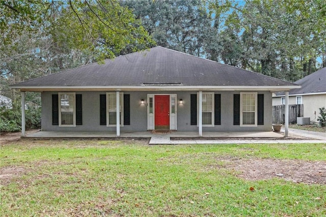 single story home featuring central AC and a front lawn