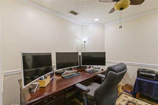 office featuring ceiling fan, ornamental molding, and a textured ceiling