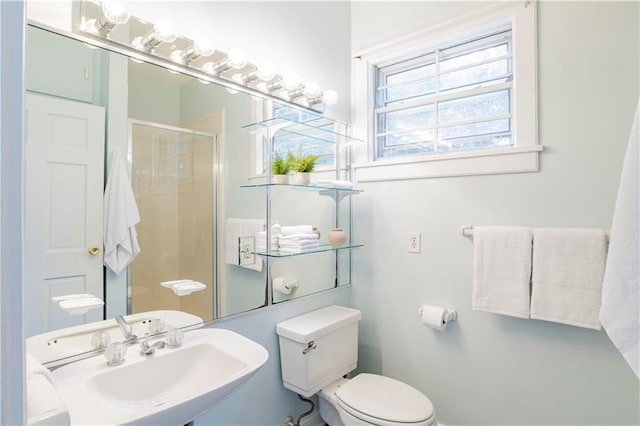 bathroom featuring sink and toilet