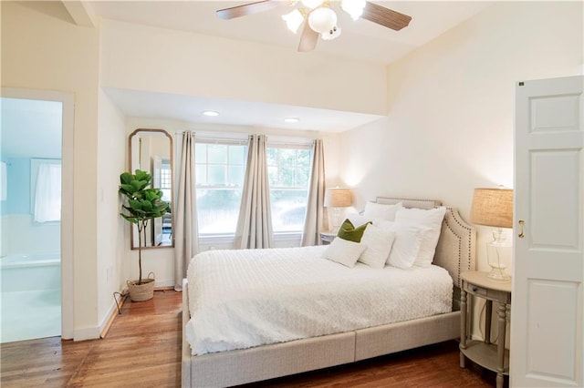 bedroom featuring hardwood / wood-style flooring and ceiling fan