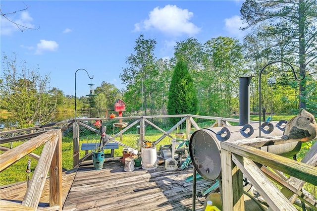 950 Red Fox Rd W, Mount Vernon, AL 36560 - view of dock featuring outdoor dining space and a wooden deck