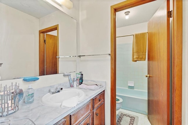 950 Red Fox Rd W, Mount Vernon, AL 36560 - bathroom with toilet, vanity, and shower / bathtub combination