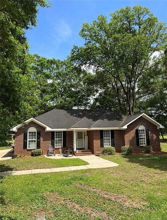 8653 Rosalene St E, Grand Bay, AL 36541 - single story home featuring a front lawn and brick siding