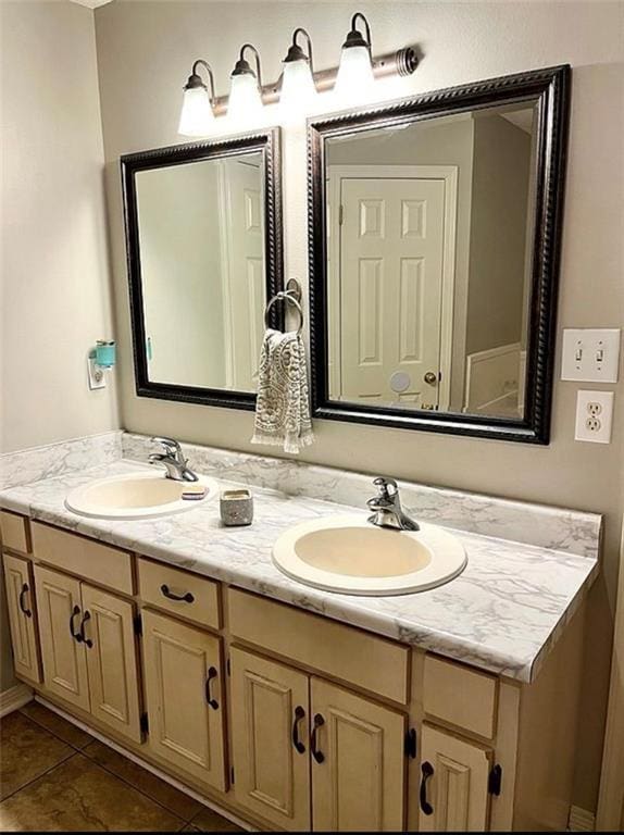 8653 Rosalene St E, Grand Bay, AL 36541 - full bathroom featuring double vanity and tile patterned floors
