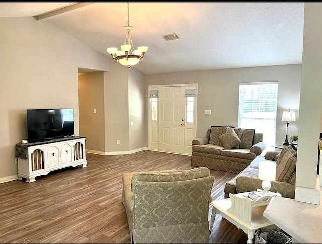 8653 Rosalene St E, Grand Bay, AL 36541 - living area featuring a chandelier, wood finished floors, and baseboards