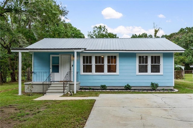 view of front of home with a front yard