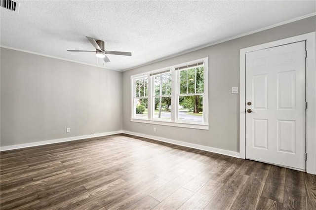 entrance foyer with dark hardwood / wood-style flooring, crown molding, a textured ceiling, and ceiling fan