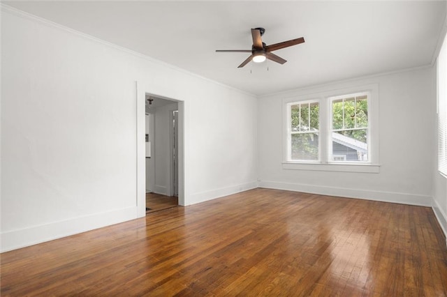 1509 Monroe St, Mobile, AL 36604 - empty room featuring a ceiling fan, hardwood / wood-style flooring, and ornamental molding