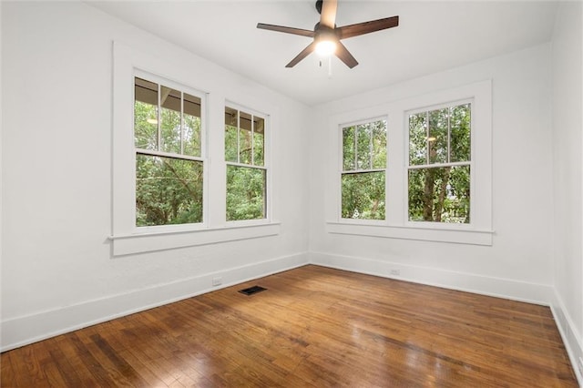 1509 Monroe St, Mobile, AL 36604 - empty room with a ceiling fan and wood finished floors
