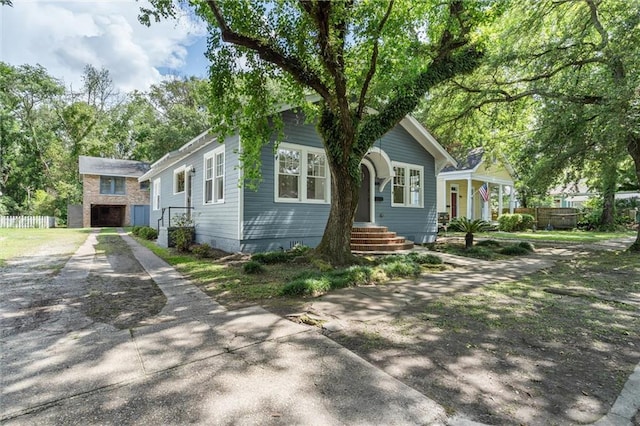 1509 Monroe St, Mobile, AL 36604 - view of front of property with concrete driveway and a garage