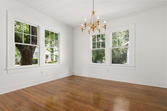 1509 Monroe St, Mobile, AL 36604 - empty room featuring a chandelier, dark wood finished floors, and crown molding