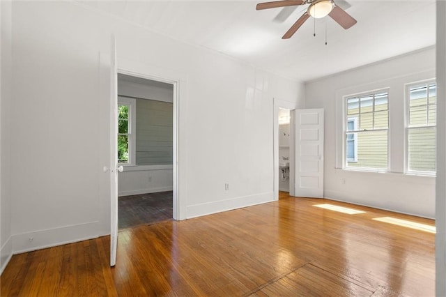 1509 Monroe St, Mobile, AL 36604 - empty room featuring hardwood / wood-style floors and a ceiling fan
