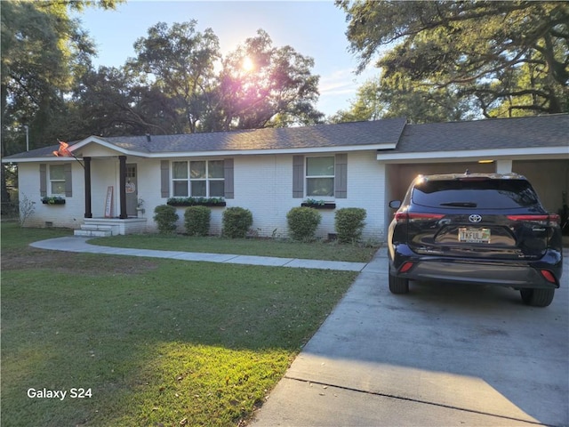 single story home with a front lawn and a garage