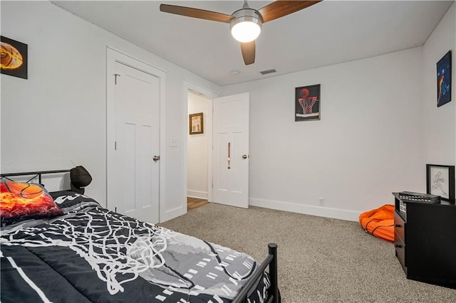 carpeted bedroom featuring ceiling fan