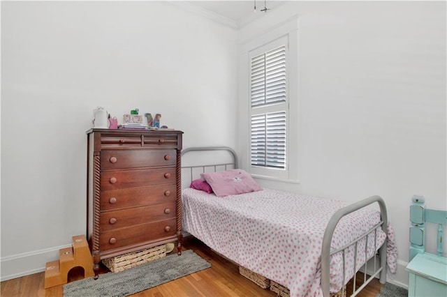 303 Monterey St S, Mobile, AL 36604 - bedroom featuring crown molding, wood finished floors, and baseboards