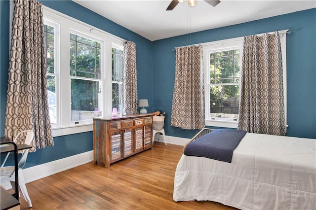 303 Monterey St S, Mobile, AL 36604 - bedroom with wood finished floors, baseboards, and ceiling fan