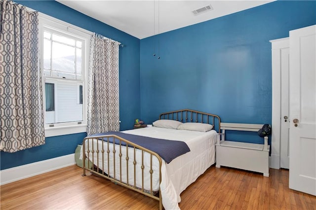 303 Monterey St S, Mobile, AL 36604 - bedroom with wood finished floors and baseboards