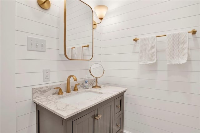 303 Monterey St S, Mobile, AL 36604 - bathroom featuring vanity and wooden walls