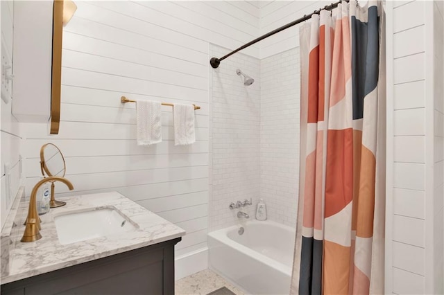 303 Monterey St S, Mobile, AL 36604 - bathroom featuring vanity, shower / bathtub combination with curtain, and wood walls
