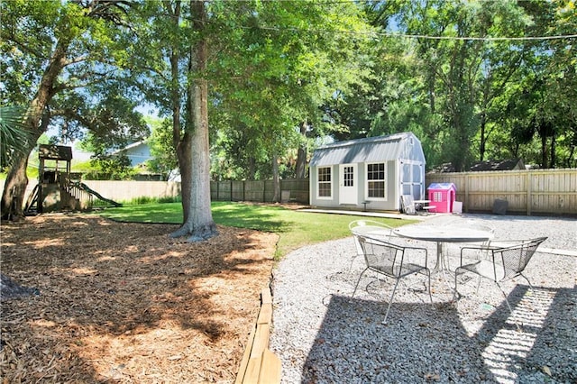 303 Monterey St S, Mobile, AL 36604 - view of yard with a patio area, a playground, and outdoor dining area