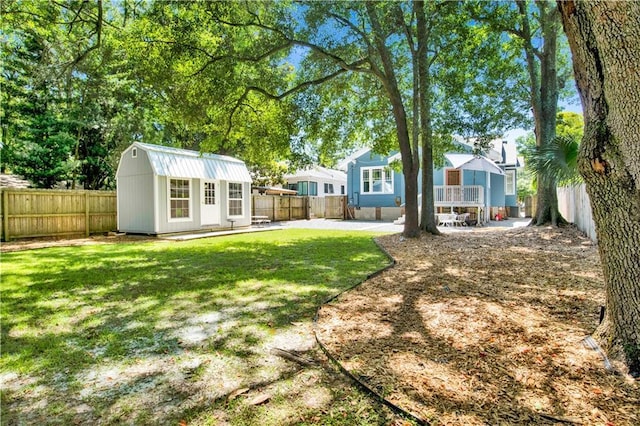 303 Monterey St S, Mobile, AL 36604 - rear view of property with an outdoor structure and a patio