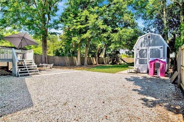 303 Monterey St S, Mobile, AL 36604 - fenced backyard with a deck